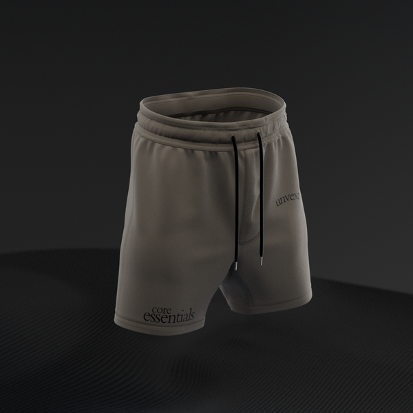 Dune Core Essentials Combat Shorts in tonal sand, front three-quarter view