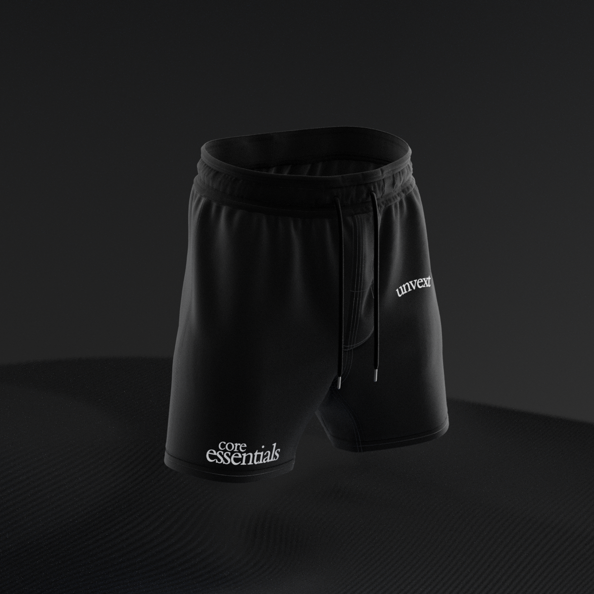 Phantom Core Essentials Combat Shorts in black, front three-quarter view
